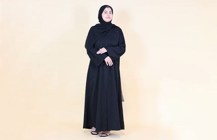 Woman wearing black abaya dress